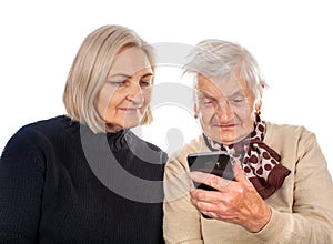 Elderly woman texting on the phone