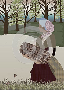 An elderly woman with twigs in her hands .