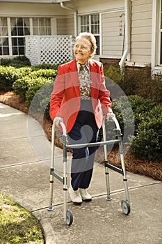 Elderly Woman Using Walker
