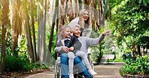 Elderly woman, wheelchair and child with lady in nature for retirement, trip or travel outdoor for adventure. Family