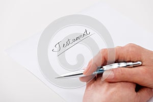 Elderly woman writing testament