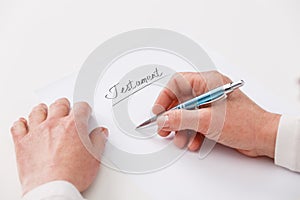 Elderly woman writing testament