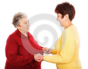 Elderly woman and young caregiver
