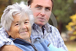 Elderly woman and young man