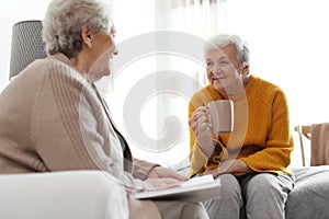 Elderly women spending time together. Senior people care