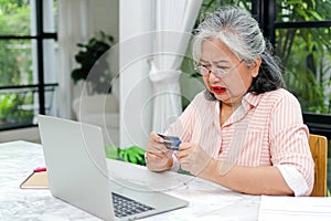 Elderly women are stressed about credit cards.