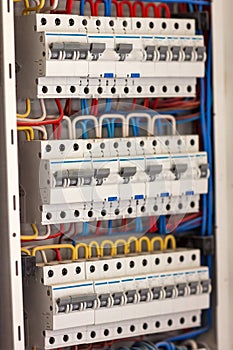 Electical distribution fuseboard. Electrical supplies. Electrical panel at a assembly line factory. Controls and switches.