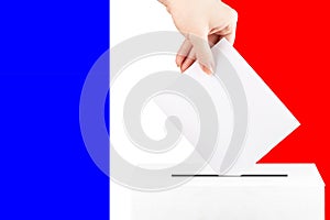 Election ballot box in france, French presidential elections, governments, a hand with a voice on the background of the flag,