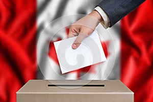 Election in Canada - voting at the ballot box photo