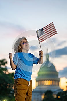 Election day. Child with American flag in Washington capitol, congress building. Voting concept. American Flag Day. Vote