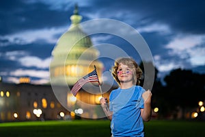 Election day for US Citizens. Child boy Vote with US flag near capitol building. Voting concept. American Flag Day. Vote
