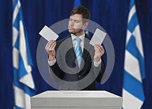 Election in Greece. Undecided voter is making decision