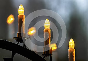 3 electric Advent candles conjure atmospheric light