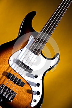 Electric Bass Guitar On Gold