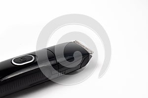 Electric black razor trimmer for shaving beards and hair shearing on a white background isolate