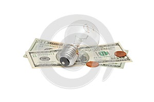 Electric bulb on dollar bills with cents