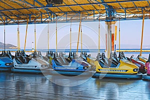 Electric bumper cars or dodgem cars photo