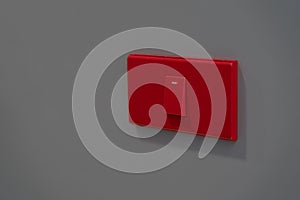 Electric button switch, electric control on-off on grey background