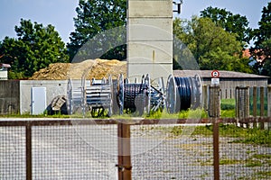 Electric cable drums near a decommissioned nuclear power plant in Bavaria, Germany