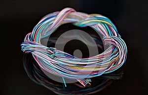 Electric cable harness of tangled colorful wires. Signal transmission