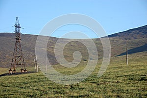 Electric cable line at tundra Chukotka photo