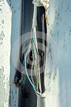 Electric cable wire for air conditioner damaged by welding