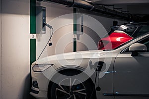 Electric car charging in a garage in Lund Sweden