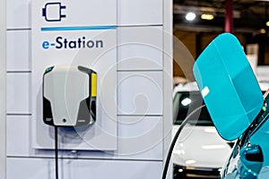 Electric car charging station, battery hybrid vehicle eco charger, future energy power, green technology