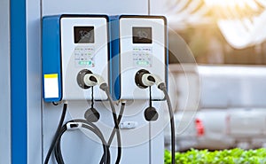 Electric car charging station for charge EV battery. Plug for vehicle with electric and hybrid engine. EV charger. Clean energy.