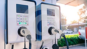 Electric car charging station for charge EV battery. Plug for vehicle with electric and hybrid engine. EV charger. Clean energy.