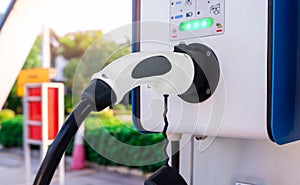 Electric car charging station for charge EV battery. Plug for vehicle with electric and hybrid engine. EV charger. Clean energy.