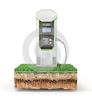 Electric car charging station for zero emissions on the piece of ground with grass