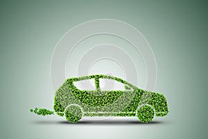 The electric car concept in green environment concept - 3d rendering