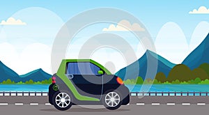 Electric car driving highway road eco friendly vehicle clean transport environment care concept beautiful mountains
