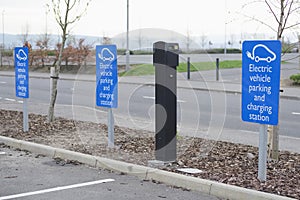 Electric charging point for vehicles cars bikes free no charge operated in shopping mall retail park in car parking space