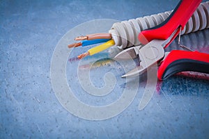 Electric conduct tubing copper cables and sharp wire cutters