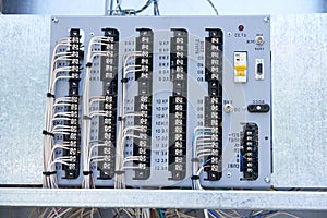 Electric control panel. The wires are connected to residual current circuit breakers and voltage monitoring relays.