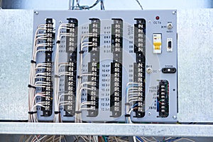 Electric control panel. The wires are connected to residual current circuit breakers and voltage monitoring relays.