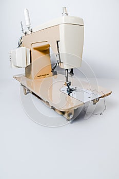 Electric, cream sewing machine