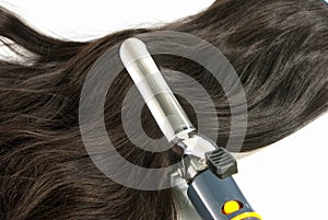 Electric curling iron and hair