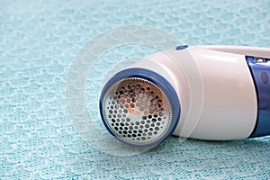 Electric device for removing hair and fluff in fabric texture