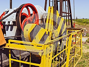 Electric drive and reducer pumping unit of an oil well