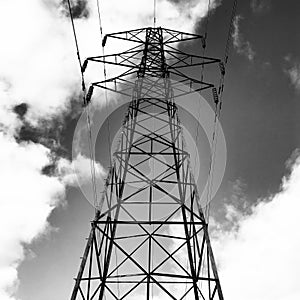 Electric pillon and clouds in the sky photo