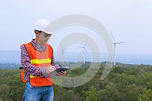 Electric Engineer writing Maintenance report on Clipboard