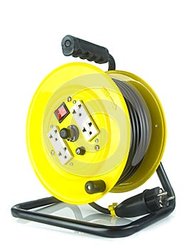 Electric extension cable reel on white