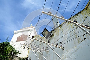 Electric fence, a fence through which an electric current can be passed, giving an electric shock to animal touching it