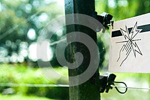 Electric fence warning sign