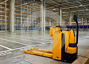 Electric forklift in storehouse