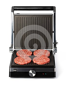 Electric grill and raw burger meat