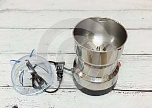 Electric grinder with plastic cover